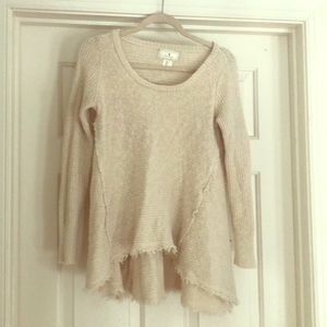 Cream, cozy distressed sweater